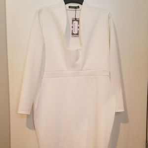White dress with plunging neckline and high collar
